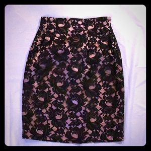 Andrea Jovine black lace over pink satin skirt